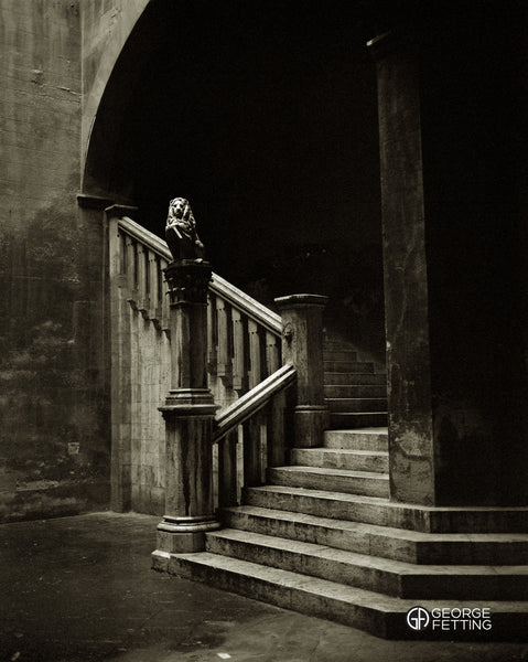 Historic stone sculpture hidden in the back streets of Sienna