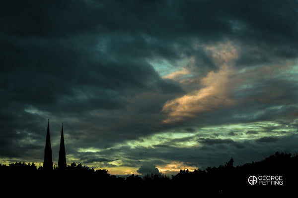 An alternative view of St Mary's Cathedral peaking above Hyde Park Sydney